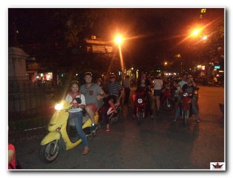street food tour hanoi on the back of scooters