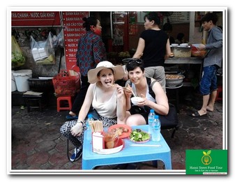street food Hanoi on the back of scooters